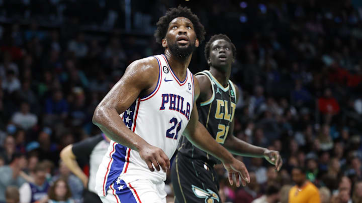 Mar 17, 2023; Charlotte, North Carolina, USA; Philadelphia 76ers center Joel Embiid (21) boxes out Charlotte Hornets forward JT Thor (21) during the second half at Spectrum Center. Mandatory Credit: Brian Westerholt-Imagn Images
