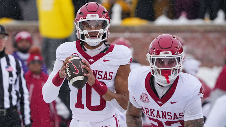 Nov 30, 2024; Columbia, Missouri, USA; Arkansas Razorbacks quarterback Taylen Green (10) drops back to pass against the Missouri Tigers during the first half at Faurot Field at Memorial Stadium. Mandatory Credit: Denny Medley-Imagn Images