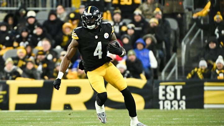 Nov 30, 2025; Pittsburgh, Pennsylvania, USA; Pittsburgh Steelers wide receiver DK Metcalf (4) runs after making a catch during the first quarter against the Buffalo Bills at Acrisure Stadium. Mandatory Credit: Barry Reeger-Imagn Images