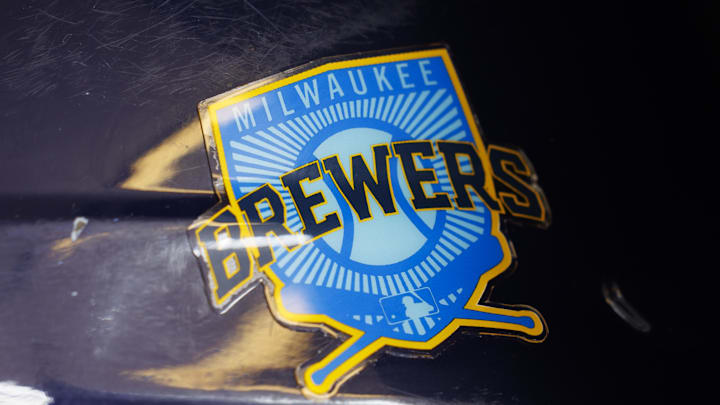 Jun 18, 2023; Milwaukee, Wisconsin, USA; A Milwaukee Brewers logo on a batting helmet in the dugout prior to the game against the Pittsburgh Pirates at American Family Field. Mandatory Credit: Jeff Hanisch-Imagn Images Jun 18, 2023; Milwaukee, Wisconsin, USA; A Milwaukee Brewers logo on a batting helmet in the dugout prior to the game against the Pittsburgh Pirates at American Family Field. Mandatory Credit: Jeff Hanisch-Imagn Images