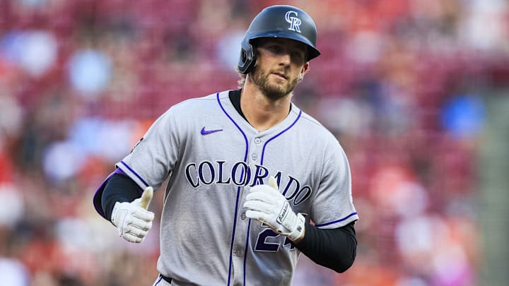 Jul 11, 2025; Cincinnati, Ohio, USA; Colorado Rockies third baseman Ryan McMahon (24) reacts after hitting a two-run home run in the fourth inning against the Cincinnati Reds at Great American Ball Park
