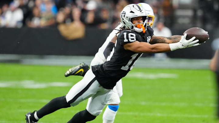 Jan 5, 2025; Paradise, Nevada, USA; Las Vegas Raiders wide receiver Jakobi Meyers (16) makes a catch against the Los Angeles Chargers during the first quarter at Allegiant Stadium. Mandatory Credit: Stephen R. Sylvanie-Imagn Images