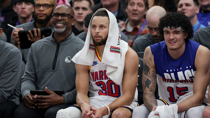 Feb 5, 2025; Salt Lake City, Utah, USA;  Golden State Warriors guard Stephen Curry (30) sits on the bench during the second quarter against the Utah Jazz at Delta Center. Mandatory Credit: Chris Nicoll-Imagn Images
