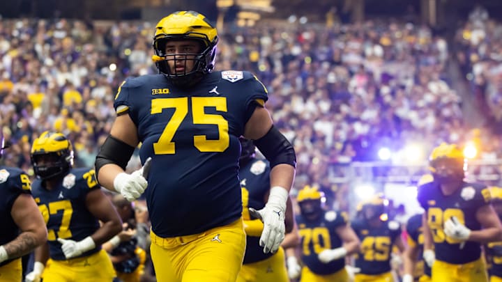 Dec 31, 2022; Glendale, Arizona, USA; Michigan Wolverines offensive lineman Andrew Gentry (75) against the TCU Horned Frogs during the 2022 Fiesta Bowl at State Farm Stadium. Mandatory Credit: Mark J. Rebilas-Imagn Images