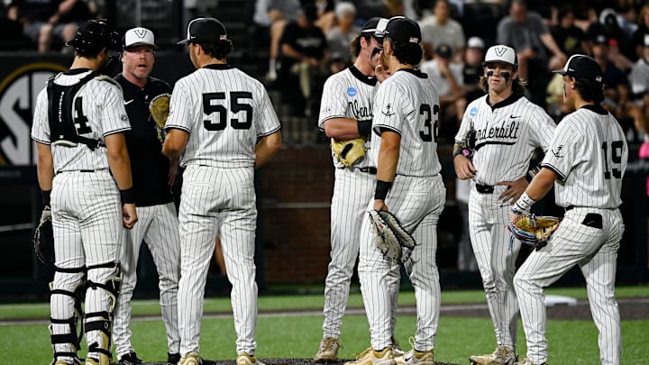 Vanderbilt pitcher Cody Bowker (55) its talked to during the fifth inning of the Nashville Regional NCAA Baseball Tournament game against Louisville at Hawkins Field Saturday, May 31, 2025, in Nashville, Tenn.