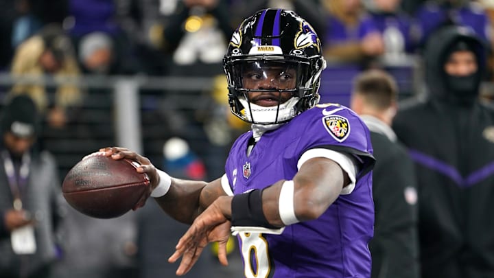 Jan 11, 2025; Baltimore, Maryland, USA; Baltimore Ravens quarterback Lamar Jackson (8) warms up before an AFC wild card game against the Pittsburgh Steelers at M&T Bank Stadium. Mandatory Credit: Mitch Stringer-Imagn Images