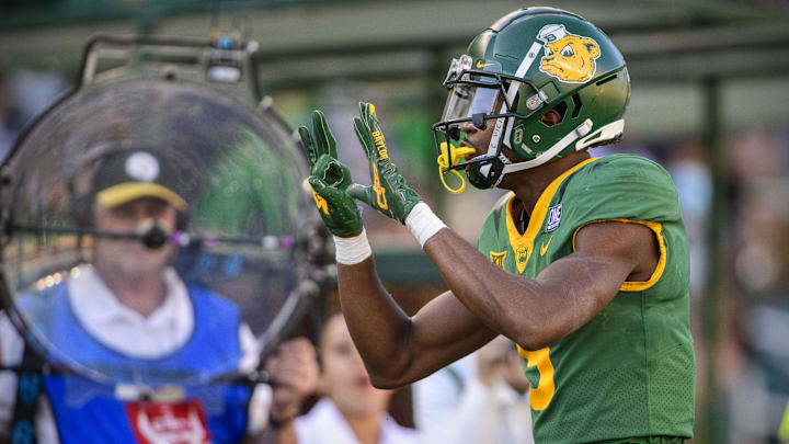 Oct 16, 2021; Waco, Texas, USA; Baylor Bears wide receiver Tyquan Thornton (9) celebrates making a first down against the Brigham Young Cougars during the second half at McLane Stadium. Mandatory Credit: Jerome Miron-Imagn Images