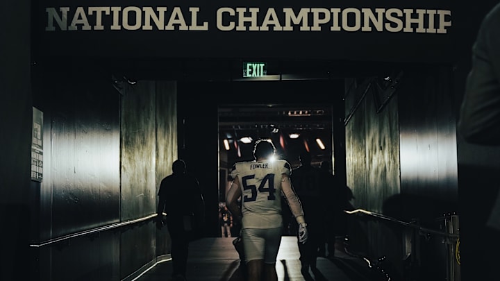 Drew Fowler heads to the locker room after losing to Michigan. 