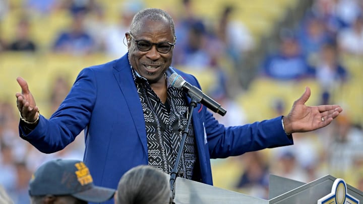 Aug 9, 2024; Los Angeles, California, USA;  Former Los Angeles Dodgers outfielder Dusty Baker speaks to fans after being inducted into the Dodgers Hall of Legends prior to the game between the Los Angeles Dodgers and the Pittsburgh Pirates at Dodger Stadium. 