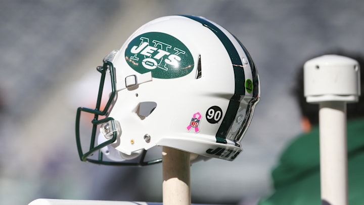 Oct 23, 2016; East Rutherford, NJ, USA; A New York Jets helmet on the bench displays a sticker with the number 90 in memory of former New York Jet Dennis Byrd who was killed in a car accident last week. The Jets face the Baltimore Ravens today at MetLife Stadium. The Jets are wearing  Mandatory Credit: Ed Mulholland-Imagn Images