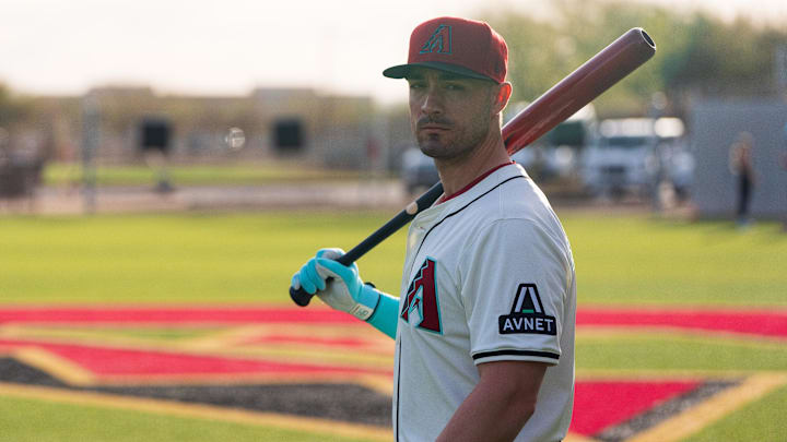 Feb 19, 2025; Scottsdale, AZ, USA; Arizona Diamondbacks outfielder Randal Grichuk (15) poses for a portrait for MLB Media Day at Salt River Fields.  Mandatory Credit: Allan Henry-Imagn Images