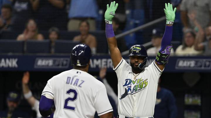 Jun 26, 2026; St. Petersburg, Florida, USA; Tampa Bay Rays designated hitter Yandy Diaz (2) celebrates a home run with third baseman Junior Caminero (13) during the seventh inning against Arizona Diamondbacks at Tropicana Field.