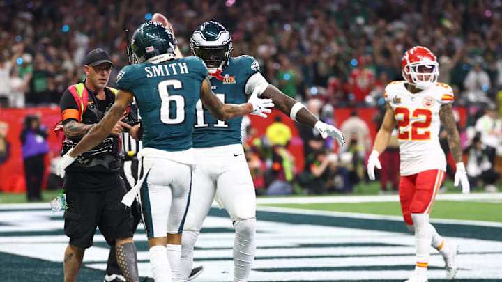 Philadelphia Eagles wide receiver DeVonta Smith (6) celebrates with Philadelphia Eagles wide receiver A.J. Brown (11) after scoring a touchdown against the Kansas City Chiefs in the third quarter in Super Bowl LIX at Ceasars Superdome. 