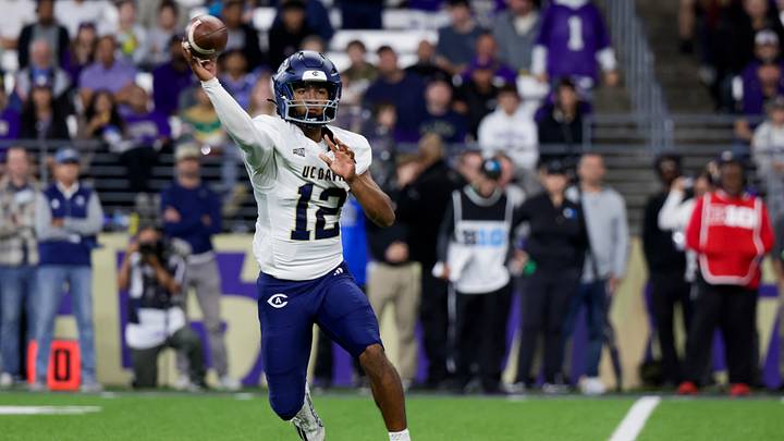 Sep 6, 2025; Seattle, Washington, USA; UC Davis Aggies quarterback Caden Pinnick (12) passes against the Washington Huskies during the first quarter at Husky Stadium. Sep 6, 2025; Seattle, Washington, USA; UC Davis Aggies quarterback Caden Pinnick (12) passes against the Washington Huskies during the first quarter at Husky Stadium.