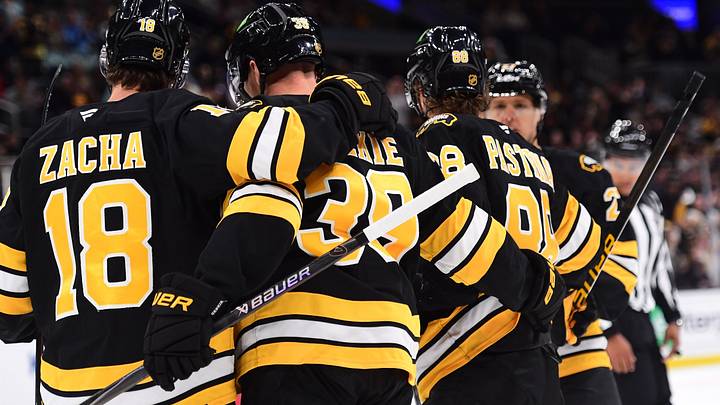 Sep 22, 2026; Boston, Massachusetts, USA; Boston Bruins center Morgan Geekie (39) celebrates his goal with center Pavel Zacha (18) and right wing David Pastrnak (88) during the third period against the Philadelphia Flyers at TD Garden. Mandatory Credit: Bob DeChiara-Imagn Images