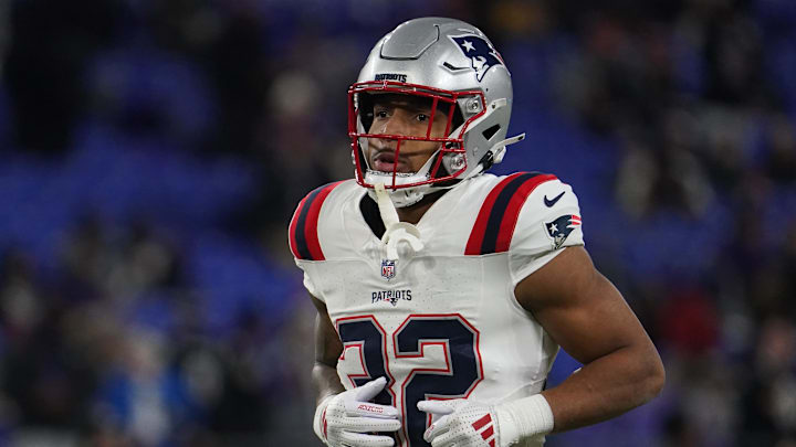 Dec 21, 2025; Baltimore, Maryland, USA;  New England Patriots running back Treveyon Henderson (32) warms up prior to the game against the Baltimore Ravens at M&T Bank Stadium. Mandatory Credit: James Lang-Imagn Images