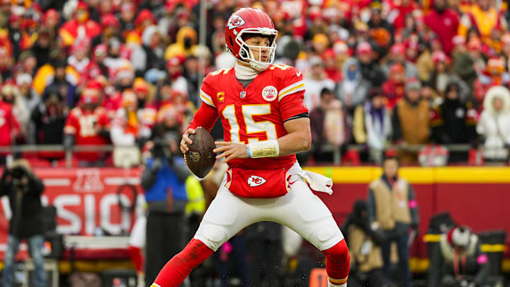 Jan 18, 2025; Kansas City, Missouri, USA; Kansas City Chiefs quarterback Patrick Mahomes (15) drops back to pass during the first half against Houston Texans in a 2025 AFC divisional round game at GEHA Field at Arrowhead Stadium. Mandatory Credit: Jay Biggerstaff-Imagn Images