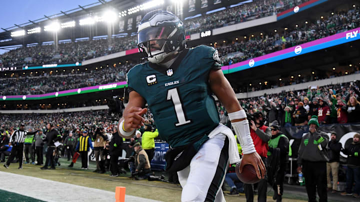 Jan 26, 2025; Philadelphia, PA, USA; Philadelphia Eagles quarterback Jalen Hurts (1) reacts after a touchdown against the Washington Commanders during the second half in the NFC Championship game at Lincoln Financial Field. Mandatory Credit: Eric Hartline-Imagn Images Jan 26, 2025; Philadelphia, PA, USA; Philadelphia Eagles quarterback Jalen Hurts (1) reacts after a touchdown against the Washington Commanders during the second half in the NFC Championship game at Lincoln Financial Field. Mandatory Credit: Eric Hartline-Imagn Images