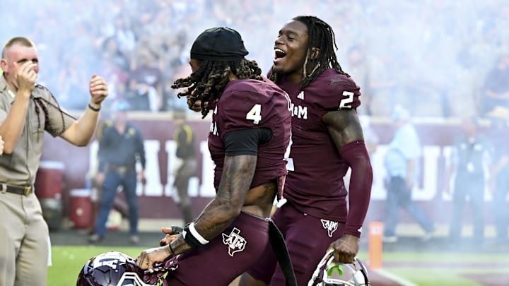 Sep 27, 2025; College Station, Texas, USA; Texas A&M Aggies cornerback Will Lee III (4) and cornerback Dezz Ricks (2) react after the game against the Auburn Tigers at Kyle Field. Mandatory Credit: Maria Lysaker-Imagn Images 