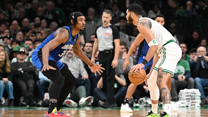 Orlando Magic center Wendell Carter Jr. (34) defends against Boston Celtics forward Jayson Tatum (0) during the first half at TD Garden.