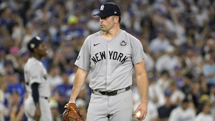 Oct 26, 2024; Los Angeles, California, USA; New York Yankees pitcher Carlos Rodon (55) reacts in the third inning against the Los Angeles Dodgers during game two of the 2024 MLB World Series at Dodger Stadium. Mandatory Credit: Jayne Kamin-Oncea-Imagn Images Oct 26, 2024; Los Angeles, California, USA; New York Yankees pitcher Carlos Rodon (55) reacts in the third inning against the Los Angeles Dodgers during game two of the 2024 MLB World Series at Dodger Stadium. Mandatory Credit: Jayne Kamin-Oncea-Imagn Images