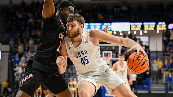 South Dakota State Jackrabbits center Oscar Cluff (45) posts up 