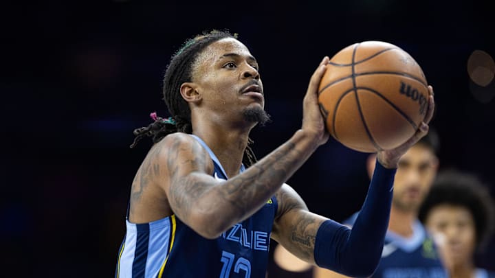 Nov 2, 2024; Philadelphia, Pennsylvania, USA; Memphis Grizzlies guard Ja Morant (12) shoots a foul shot against the Philadelphia 76ers during the fourth quarter at Wells Fargo Center. Mandatory Credit: Bill Streicher-Imagn Images