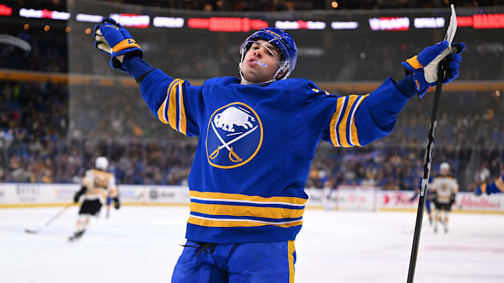JJ Peterka (77) celebrating one of his three goals in a game against the Boston Bruins earlier this year. 