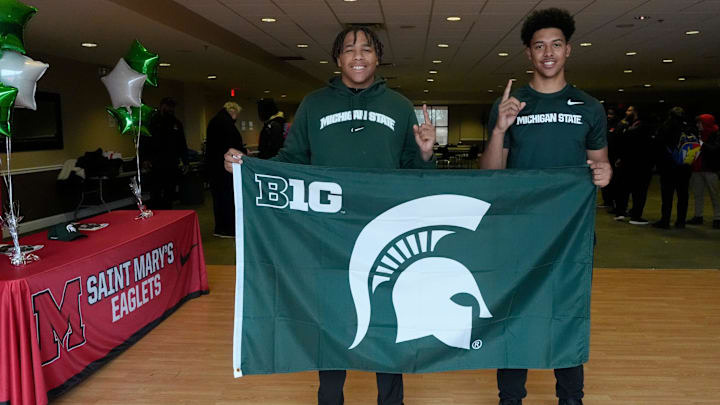 From left, Charles White and Jayden Savoury show off their pride after signing to play football with Michigan State University at Orchard Lake St. Mary’s Preparatory in Orchard Lake on Wednesday, Dec. 4, 2024. From left, Charles White and Jayden Savoury show off their pride after signing to play football with Michigan State University at Orchard Lake St. Mary’s Preparatory in Orchard Lake on Wednesday, Dec. 4, 2024.
