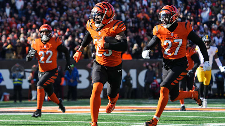 Bengals Cam Taylor-Britt (29) intercepts the ball and runs it back for a Bengals touchdown during their game against the Steelers at Paycor Stadium on Sunday December 1, 2024. Steelers lead the game at halftime with a score of 27-21. Bengals Cam Taylor-Britt (29) intercepts the ball and runs it back for a Bengals touchdown during their game against the Steelers at Paycor Stadium on Sunday December 1, 2024. Steelers lead the game at halftime with a score of 27-21.