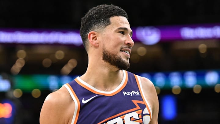 Mar 16, 2026; Boston, Massachusetts, USA; Phoenix Suns guard Devin Booker (1) reacts after a game against the Boston Celtics during the second half at the TD Garden. Mandatory Credit: Brian Fluharty-Imagn Images