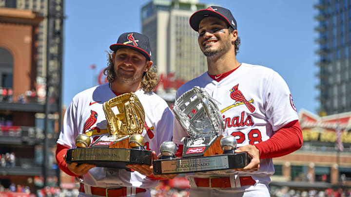 Apr 2, 2023; St. Louis, Missouri, USA; St. Louis Cardinals second baseman Brendan Donovan (33) and third baseman Nolan Arenado (28) poses for a photo with their Rawlings gold and platinum glove awards before a game against the Toronto Blue Jays at Busch Stadium. Mandatory Credit: Jeff Curry-Imagn Images Apr 2, 2023; St. Louis, Missouri, USA; St. Louis Cardinals second baseman Brendan Donovan (33) and third baseman Nolan Arenado (28) poses for a photo with their Rawlings gold and platinum glove awards before a game against the Toronto Blue Jays at Busch Stadium. Mandatory Credit: Jeff Curry-Imagn Images