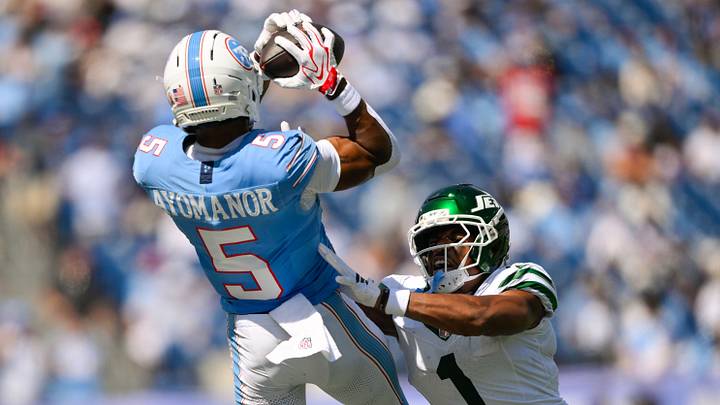 Sep 13, 2026; Nashville, Tennessee, USA; Tennessee Titans wide receiver Elic Ayomanor (5) makes a catch as New York Jets cornerback Azareye'h Thomas (1) pushes him out of bounds during the second half at Nissan Stadium. Mandatory Credit: Steve Roberts-Imagn Images Sep 13, 2026; Nashville, Tennessee, USA; Tennessee Titans wide receiver Elic Ayomanor (5) makes a catch as New York Jets cornerback Azareye'h Thomas (1) pushes him out of bounds during the second half at Nissan Stadium. Mandatory Credit: Steve Roberts-Imagn Images