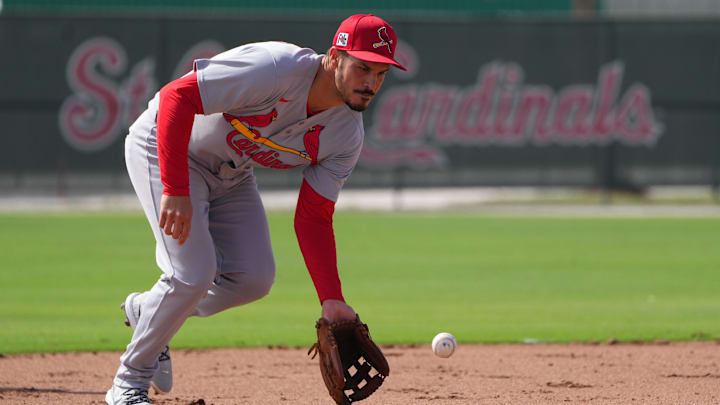 Feb 17, 2025; Jupiter, FL, USA;  St. Louis Cardinals third base Nolan Arenado (28) takes infield practice at spring training. 