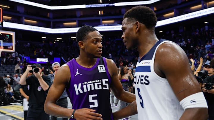 Nov 15, 2024; Sacramento, California, USA; Sacramento Kings guard De'Aaron Fox (5) and Minnesota Timberwolves guard Anthony Edwards (5) meet after the game at Golden 1 Center. Mandatory Credit: Sergio Estrada-Imagn Images