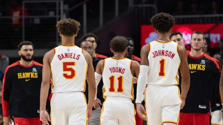 Oct 25, 2024; Atlanta, Georgia, USA; Atlanta Hawks guard Dyson Daniels (5), guard Trae Young (11), forward Jalen Johnson (1), forward De’Andre Hunter (12), and center Clint Cappella (15) walk to the bench in the game against the Charlotte Hornets during the first quarter at State Farm Arena. Mandatory Credit: Jordan Godfree-Imagn Images Oct 25, 2024; Atlanta, Georgia, USA; Atlanta Hawks guard Dyson Daniels (5), guard Trae Young (11), forward Jalen Johnson (1), forward De’Andre Hunter (12), and center Clint Cappella (15) walk to the bench in the game against the Charlotte Hornets during the first quarter at State Farm Arena. Mandatory Credit: Jordan Godfree-Imagn Images