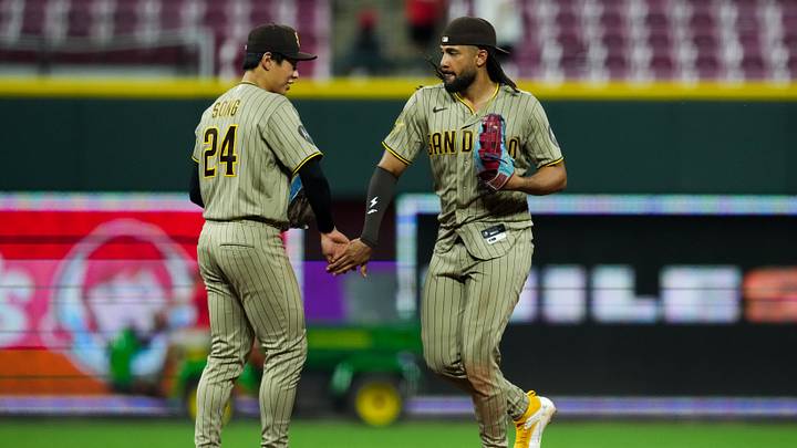 Aug 31, 2026; Cincinnati, Ohio, USA;  San Diego Padres shortstop Sung-Mun Song, left, and outfielder Fernando Tatis Jr., right, high-five after defeating the Cincinnati Reds at Great American Ball Park. Mandatory Credit: Aaron Doster-Imagn Images