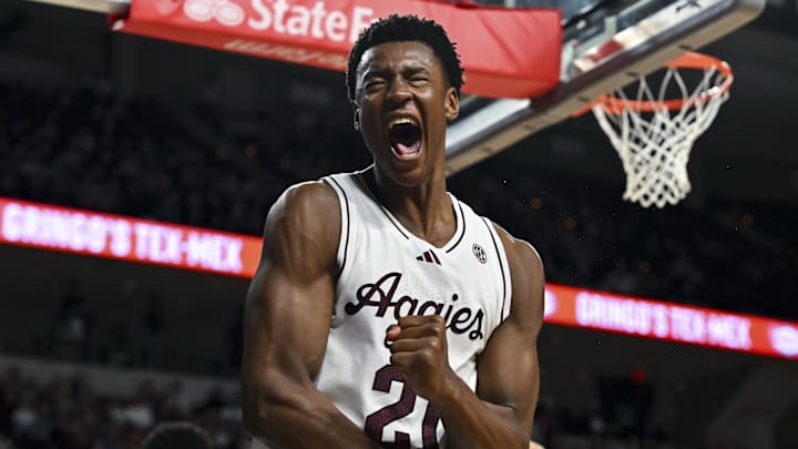Feb 11, 2025; College Station, Texas, USA; Texas A&M Aggies forward Pharrel Payne (21) reacts after blocking Georgia Bulldogs guard Silas Demary Jr. (not pictured) during the second half at Reed Arena. Mandatory Credit: Maria Lysaker-Imagn Images 