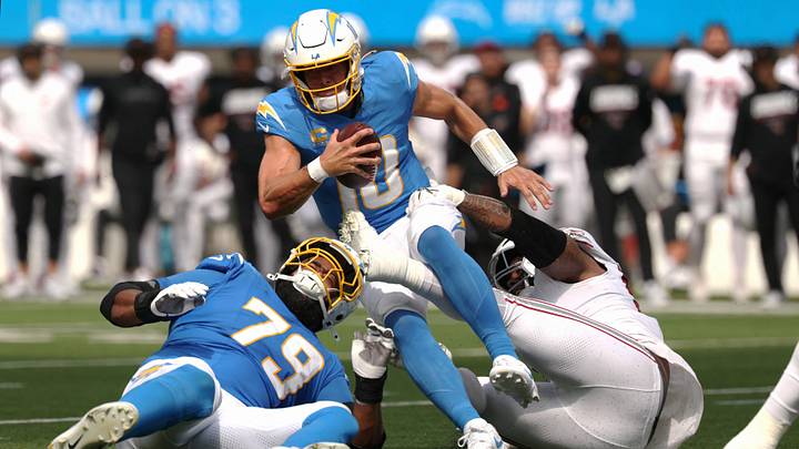 Sep 13, 2026; Inglewood, California, USA; Arizona Cardinals defensive line Dante Stills (55) sacks Los Angeles Chargers quarterback Justin Herbert (10) during the second quarter at SoFi Stadium. Mandatory Credit: Kiyoshi Mio-Imagn Images Sep 13, 2026; Inglewood, California, USA; Arizona Cardinals defensive line Dante Stills (55) sacks Los Angeles Chargers quarterback Justin Herbert (10) during the second quarter at SoFi Stadium. Mandatory Credit: Kiyoshi Mio-Imagn Images