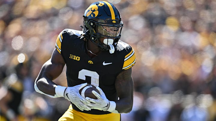Sep 7, 2024; Iowa City, Iowa, USA; Iowa Hawkeyes running back Kaleb Johnson (2) runs for a 27 yard touchdown against the Iowa State Cyclones during the first quarter at Kinnick Stadium. Mandatory Credit: Jeffrey Becker-Imagn Images
