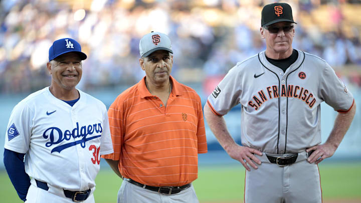 Jul 22, 2024; Los Angeles, California, USA; Los Angeles Dodgers manager Dave Roberts (30), Michael Mays, son of Willy Mays and San Francisco Giants manager Bob Melvin (6) stand during a pregame ceremony to honor Mays at Dodger Stadium. Jul 22, 2024; Los Angeles, California, USA; Los Angeles Dodgers manager Dave Roberts (30), Michael Mays, son of Willy Mays and San Francisco Giants manager Bob Melvin (6) stand during a pregame ceremony to honor Mays at Dodger Stadium.