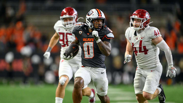 Nov 1, 2025; Corvallis, Oregon, USA; Oregon State Beavers running back Anthony Hankerson (0) brakes away on a big run during the fourth quarter against the Washington State Cougars at Reser Stadium. Mandatory Credit: Craig Strobeck-Imagn Images Nov 1, 2025; Corvallis, Oregon, USA; Oregon State Beavers running back Anthony Hankerson (0) brakes away on a big run during the fourth quarter against the Washington State Cougars at Reser Stadium. Mandatory Credit: Craig Strobeck-Imagn Images