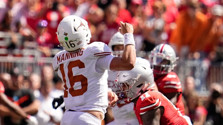 Ohio State Buckeyes linebacker C.J. Hicks (11) pressures Texas Longhorns quarterback Arch Manning (16) during the second half of the NCAA football game at Ohio Stadium on Aug. 30, 2025. Ohio State won 14-7.
