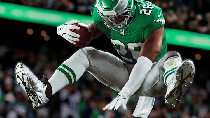 Saquon Barkley wears the Nike LeBron 4 cleats on the Madden NFL 26 cover.