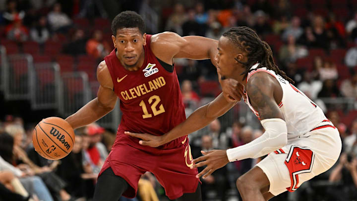 Oct 9, 2025; Chicago, Illinois, USA; Cleveland Cavaliers forward De'Andre Hunter (12) controls the ball against the Chicago Bulls during the first half at United Center. Mandatory Credit: Patrick Gorski-Imagn Images