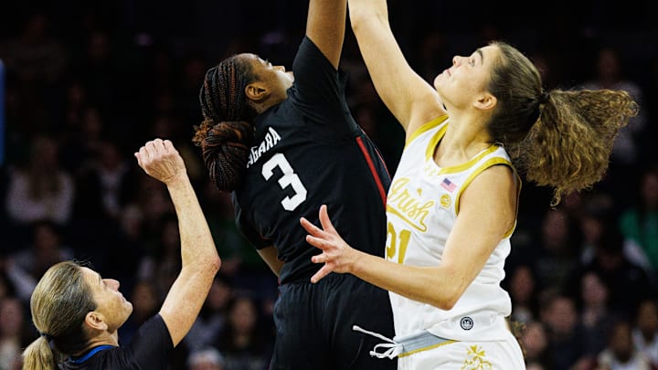 Notre Dame forward Maddy Westbeld (21) and Stanford forward Nunu Agara (3) tip-off a NCAA women's basketball game between Notre Dame and Stanford at Purcell Pavilion on Thursday, Feb. 6, 2025, in South Bend.