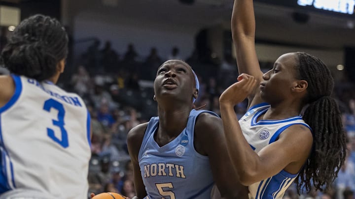 Mar 28, 2025; Birmingham, AL, USA; North Carolina Tar Heels forward center Maria Gakdeng (5) works against Duke Blue Devils guard forward Jadyn Donovan (4) during the Sweet 16 NCAA Tournament basketball game at Legacy Arena. 