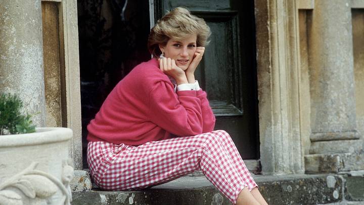 Diana, Princess of Wales, relaxes on the steps of her home, Highgrove House, in Gloucestershire, on July 18, 1986.