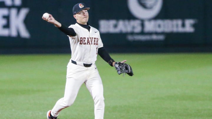 Oregon State's Cooper Vance throws the ball to first base during an NCAA college baseball game at Goss Stadium on Friday, March 6, 2026, in Corvallis, Ore.