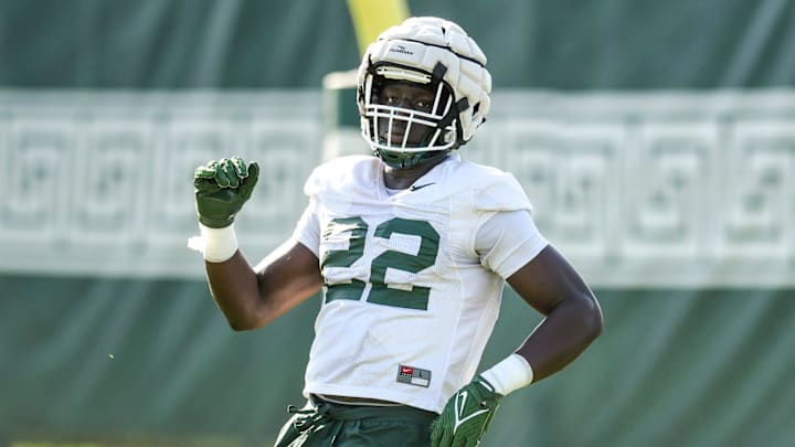 Michigan State defensive lineman Jordon Bai Jobe runs a drill during the opening day of MSU's football fall camp on Thursday, Aug. 3, 2023, in East Lansing.